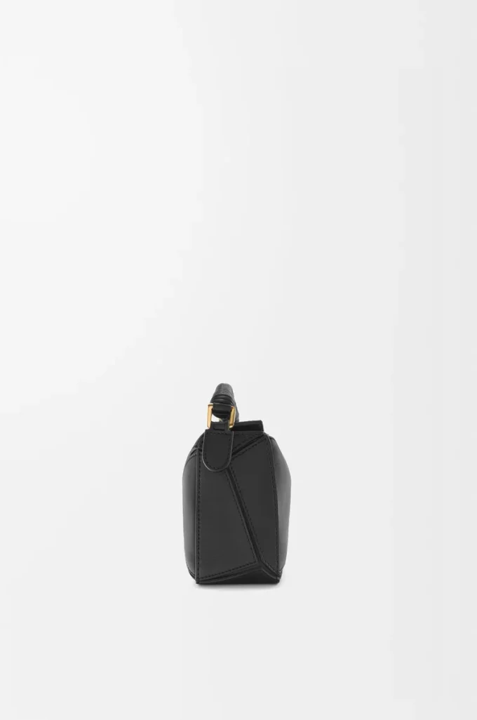 Bolso Mini Puzzle en piel de becerro lisa, color negro