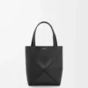 Bolso mini Puzzle Fold en piel de becerro brillante, color negro Bolso mini Puzzle Fold en piel de becerro brillante, color negro