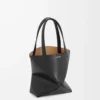 Bolso mini Puzzle Fold en piel de becerro brillante, color negro Bolso mini Puzzle Fold en piel de becerro brillante, color negro