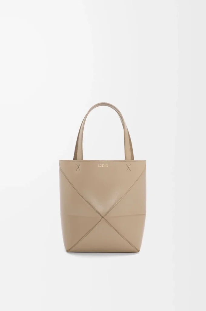 Bolso Mini Puzzle Fold en piel de becerro brillante Sand Bolso Mini Puzzle Fold en piel de becerro brillante Sand