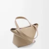 Bolso Mini Puzzle Fold en piel de becerro brillante Sand Bolso Mini Puzzle Fold en piel de becerro brillante Sand