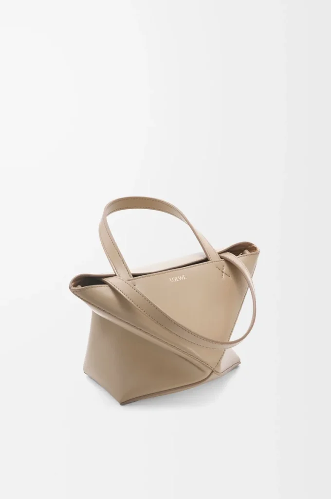 Bolso Mini Puzzle Fold en piel de becerro brillante Sand Bolso Mini Puzzle Fold en piel de becerro brillante Sand
