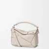 Bolso Panta pequeño Puzzle en piel de becerro brillante Light Ghost