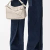 Bolso Panta pequeño Puzzle en piel de becerro brillante Light Ghost