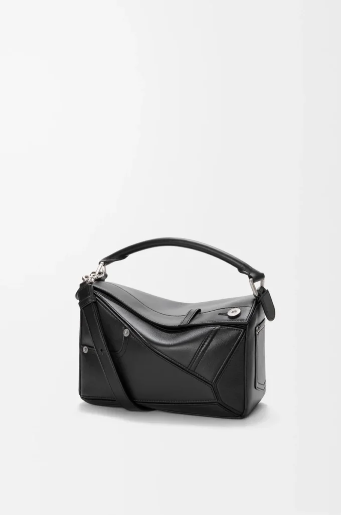 Bolso Panta pequeño Puzzle en piel de becerro brillante Negro Bolso Panta pequeño Puzzle en piel de becerro brillante Negro