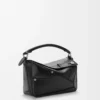 Bolso Panta pequeño Puzzle en piel de becerro brillante Negro Bolso Panta pequeño Puzzle en piel de becerro brillante Negro