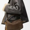 Bolso pequeño Featherlight Puzzle en nubuck granulado color tundra