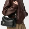 Bolso pequeño Puzzle Biker en piel de becerro brillante color negro Bolso pequeño Puzzle Biker en piel de becerro brillante color negro