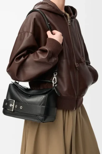 Bolso pequeño Puzzle Biker en piel de becerro brillante color negro