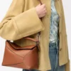 Bolso pequeño Puzzle Edge en piel de becerro clásica color Tan Bolso pequeño Puzzle Edge en piel de becerro clásica color Tan