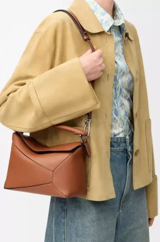 Bolso pequeño Puzzle Edge en piel de becerro clásica color Tan
