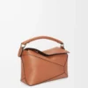 Bolso pequeño Puzzle Edge en piel de becerro clásica color Tan Bolso pequeño Puzzle Edge en piel de becerro clásica color Tan