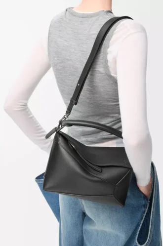 Bolso pequeño Puzzle Edge en piel de becerro clásica negro
