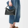 Bolso pequeño Puzzle Edge en piel de becerro clásica negro