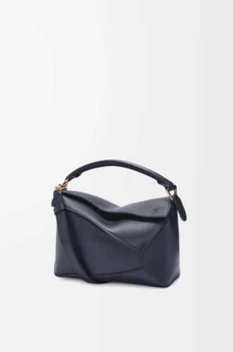 Bolso pequeño Puzzle Edge en piel de becerro granulada suave azul marino oscuro