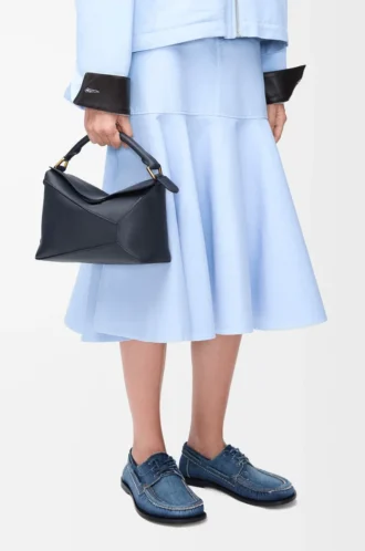 Bolso pequeño Puzzle Edge en piel de becerro granulada suave azul marino oscuro