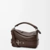 Bolso Puzzle Biker pequeño en piel de becerro brillante Marrón oscuro Bolso Puzzle Biker pequeño en piel de becerro brillante Marrón oscuro
