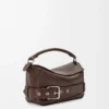 Bolso Puzzle Biker pequeño en piel de becerro brillante Marrón oscuro Bolso Puzzle Biker pequeño en piel de becerro brillante Marrón oscuro