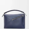 Bolso Puzzle Edge grande en piel de becerro clásica azul abismo