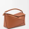 Bolso Puzzle Edge grande en piel de becerro clásica color tostado