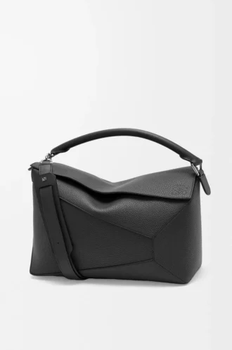 Bolso Puzzle Edge grande en piel de becerro granulada, color negro