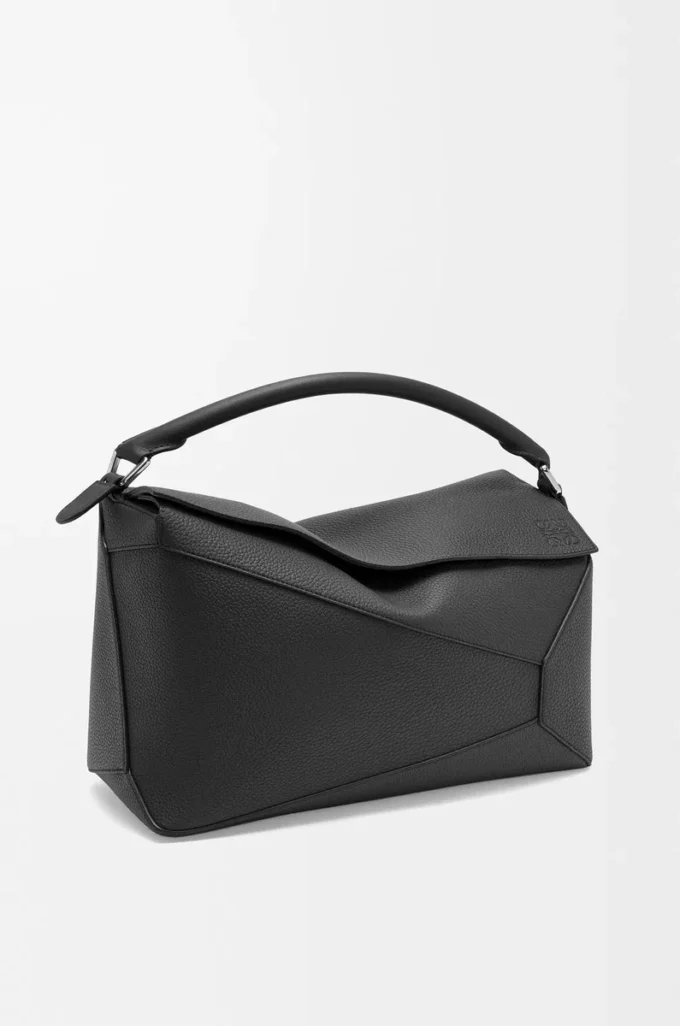 Bolso Puzzle Edge grande en piel de becerro granulada, color negro Bolso Puzzle Edge grande en piel de becerro granulada, color negro