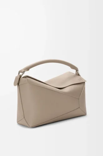 Bolso Puzzle Edge mediano en piel de becerro granulada suave color arcilla