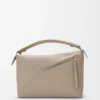 Bolso Puzzle Edge mediano en piel de becerro granulada suave color arcilla Bolso Puzzle Edge mediano en piel de becerro granulada suave color arcilla