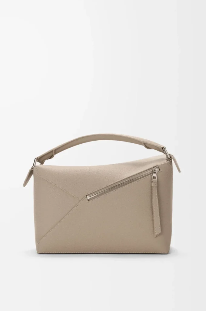 Bolso Puzzle Edge mediano en piel de becerro granulada suave color arcilla Bolso Puzzle Edge mediano en piel de becerro granulada suave color arcilla