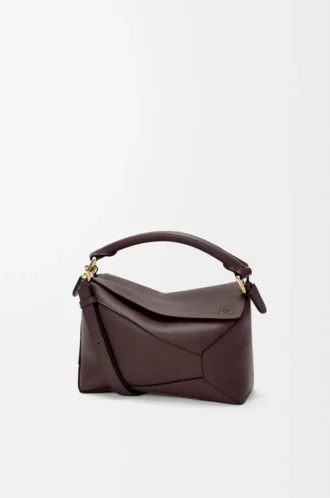 Bolso Puzzle Edge pequeño en piel de becerro granulada suave color castaño oscuro