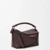 Bolso Puzzle Edge pequeño en piel de becerro granulada suave color castaño oscuro Bolso Puzzle Edge pequeño en piel de becerro granulada suave color castaño oscuro