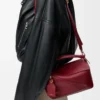 Bolso Puzzle Featherlight pequeño en piel de cordero napa rojo quemado Bolso Puzzle Featherlight pequeño en piel de cordero napa rojo quemado