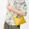 Bolso Puzzle Fold en piel de becerro napa brillante Dandelion