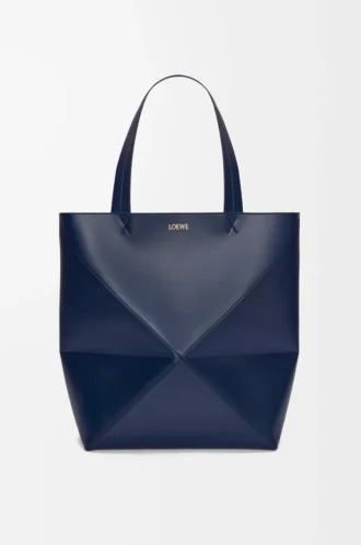 Bolso Puzzle Fold XL en piel de becerro brillante azul abismo