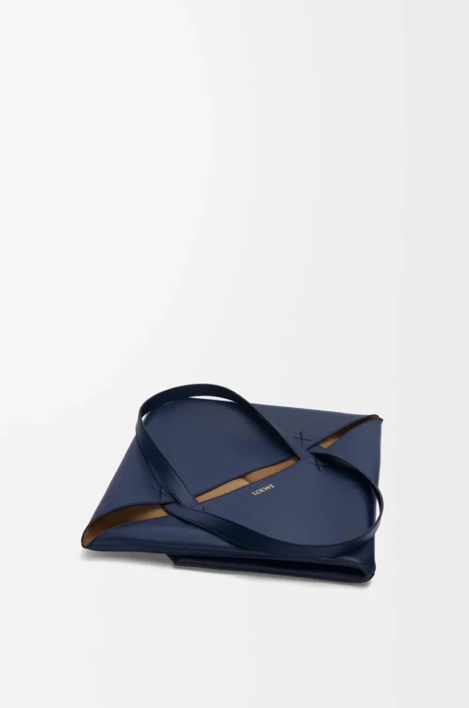 Bolso Puzzle Fold XL en piel de becerro brillante azul abismo