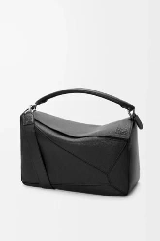 Bolso Puzzle grande en piel de becerro granulada flexible, color negro
