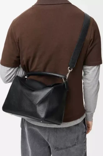 Bolso Puzzle grande en piel de becerro granulada flexible, color negro
