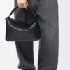 Bolso Puzzle grande en piel de becerro granulada flexible, color negro Bolso Puzzle grande en piel de becerro granulada flexible, color negro