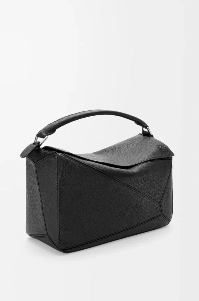 Bolso Puzzle grande en piel de becerro granulada flexible, color negro Bolso Puzzle grande en piel de becerro granulada flexible, color negro