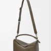 Bolso Puzzle grande en piel de becerro granulada flexible color tundra