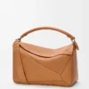Bolso Puzzle grande en piel de becerro granulada flexible marrón claro cañón Bolso Puzzle grande en piel de becerro granulada flexible marrón claro cañón