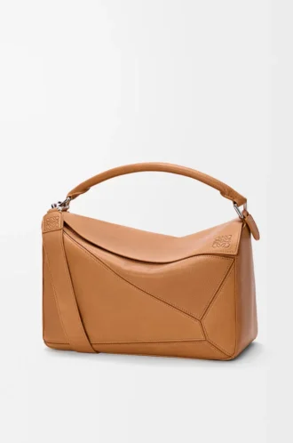Bolso Puzzle grande en piel de becerro granulada flexible marrón claro cañón