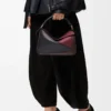 Bolso Puzzle pequeño en piel de becerro napa Negro/Burdeos Bolso Puzzle pequeño en piel de becerro napa Negro/Burdeos