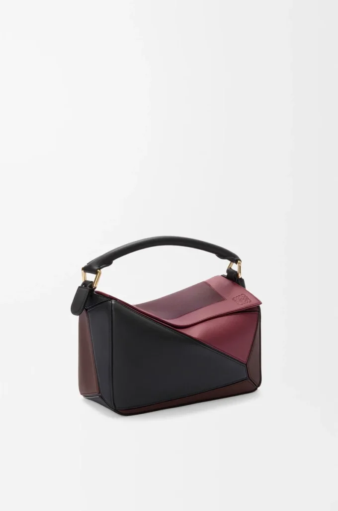 Bolso Puzzle pequeño en piel de becerro napa Negro/Burdeos Bolso Puzzle pequeño en piel de becerro napa Negro/Burdeos