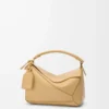 Bolso Puzzle pequeño Featherlight en piel de cordero napa Dark Butter Bolso Puzzle pequeño Featherlight en piel de cordero napa Dark Butter