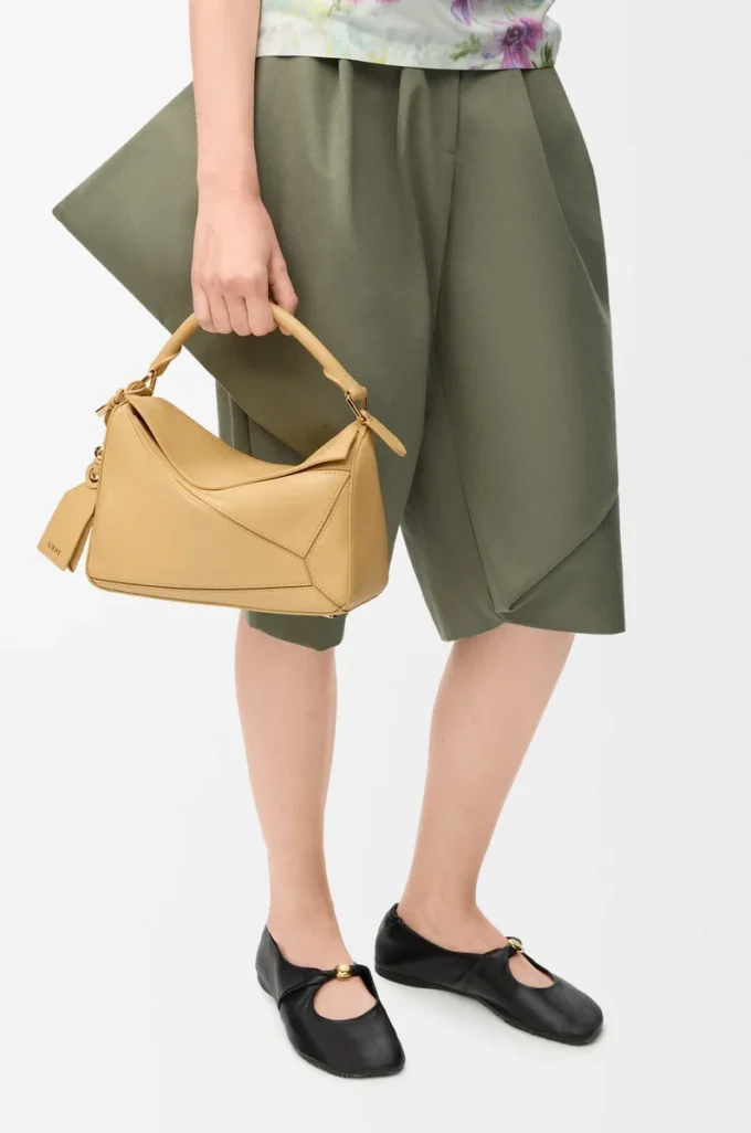 Bolso Puzzle pequeño Featherlight en piel de cordero napa Dark Butter Bolso Puzzle pequeño Featherlight en piel de cordero napa Dark Butter