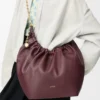 Bolso Squeeze mediano en piel de cordero napa suave Burdeos oscuro Bolso Squeeze mediano en piel de cordero napa suave Burdeos oscuro