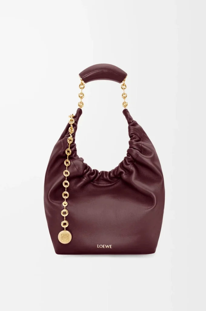 Bolso Squeeze pequeño en suave piel de cordero napa Burdeos oscuro Bolso Squeeze pequeño en suave piel de cordero napa Burdeos oscuro