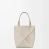 Bolso tote Mini Puzzle Fold en piel de becerro granulada suave Light Ghost Bolso tote Mini Puzzle Fold en piel de becerro granulada suave Light Ghost