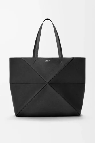 Bolso tote Puzzle Fold grande horizontal en suave piel de becerro granulada. Negro Bolso tote Puzzle Fold grande horizontal en suave piel de becerro granulada. Negro